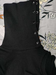 Black Sleeveless Turtleneck Top