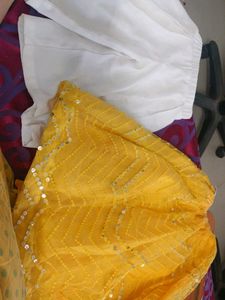 Yellow Embroidered skirt and white plazzo