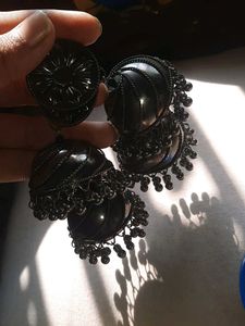 The black and big earring