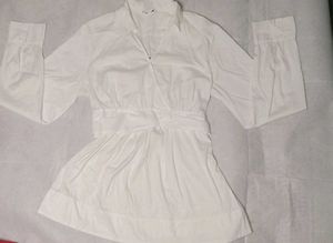 Soft White Peplum Top with Structured Waist✨