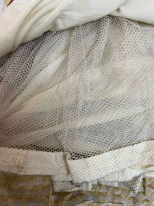 Off white Lengha Choli With Golden Shimmer Blouse