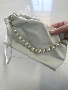 White sling bag with Pearl Handle