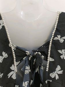 Georgette Frock With Pearls On The Neck