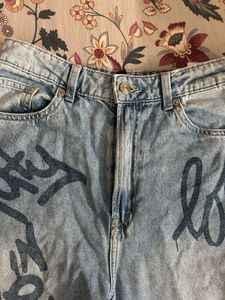 Vintage-Inspired Graffiti Print Wide-Leg Jeans