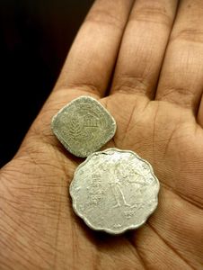 2 Coins Of 10 Paise And 5.