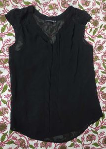 A cute transparent black top