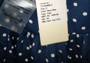 Navy Blue Polka Doted Peplum Top