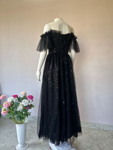 Black sequined Lux gown
