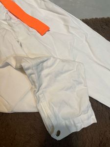 White High-Waisted Cotton Pants with Orange Belt