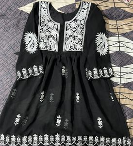 Woman embroidered georgettee A-line Kurta(black)