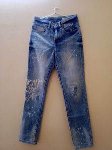 Distressed Denim Jeans