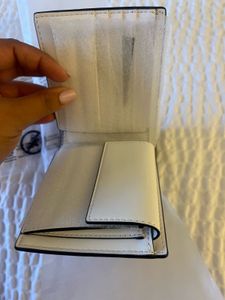 ☘️☘️sale☘️☘️Authentic MK WHITE WALLET MAN