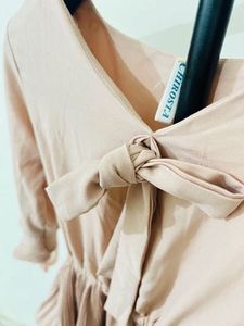 Cute Peach Peplum Top with Bow