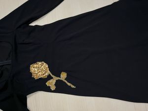 Black Dress with Gold Rose Detail