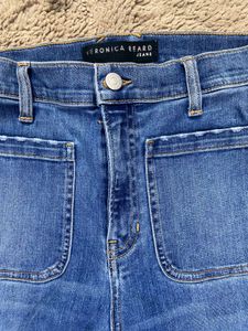 Flared Denim Jeans with patch pockets