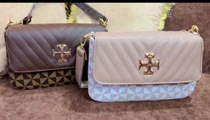 Elegant Tory Burch Handbag with 2 belts