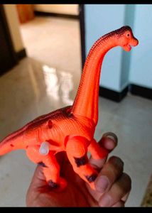 2 Dinosaur Toys.