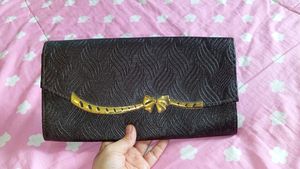 Vintage Bow Accent Clutch