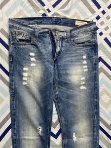 Distressed Denim Jeans