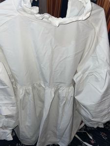 White long sleeve top