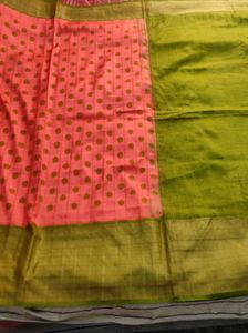 orange and green pocham.palli silk saree
