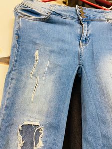 Select Skinny Distressed Jeans