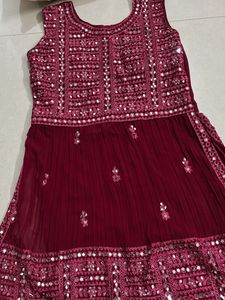 Red Mirror work lehanga with flared bottom and net