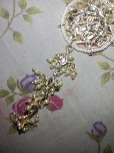 Earing And Tika