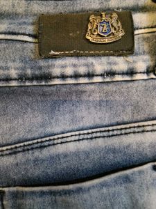 Distressed Denim Capris