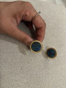 Blue cufflinks with golden border