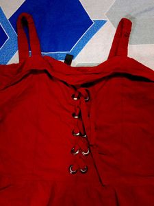 Sleeveless Beautiful Top In Maroon Colour