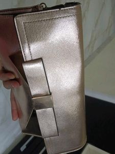 Metallic Bow Clutch