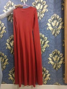 Elegant Red Gown with Cape Sleeves