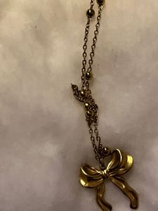 Gold Tone Bow Pendant Necklace