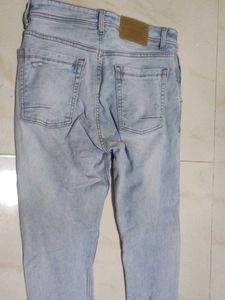 Distressed Denim Jeans