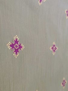 Elegant Mehendi Green Saree with fancy Blouse