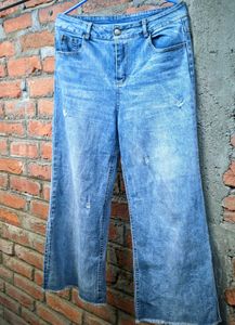 Light blue wide-leg jeans.
