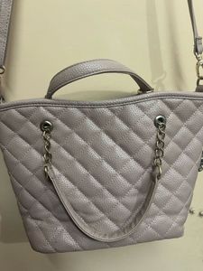 Caprese Sling Bad And Hand Bag