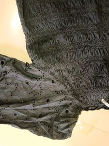 Chic Black Top With Puffy Sleeves