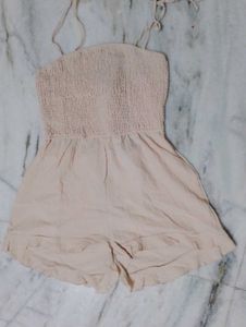 Beige Romper with Ruffle Detail