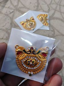 Gold Pendant with Gemstones