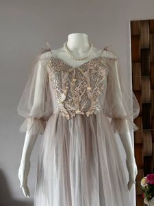 Faint pink tulle gown