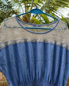 Blue dress net detailing with self tie at back
