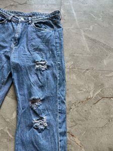 Ripped Blue Denim Jeans