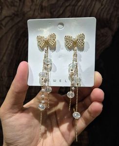 Bow Shape Pearls Tassel Earrings