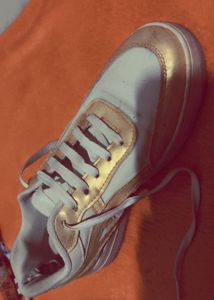 golden white shoes