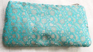 Elegant Turquoise Brocade Clutch with Silver Flora