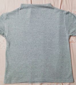 Grey woolen soft top with black design