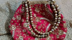 Red Embroidered Clutch