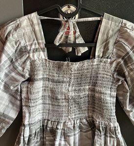 Checkered Peplum Top